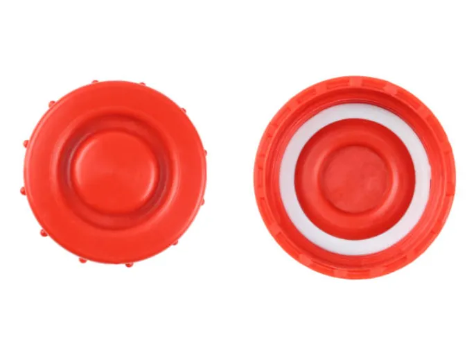 Two sides of big plastic canister cap